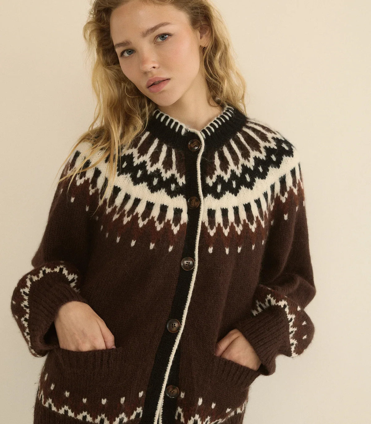 SWEATERS